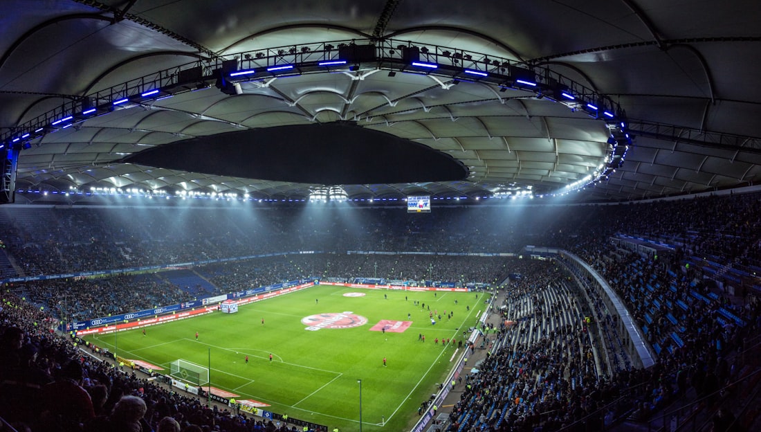 Stadion sepak bola sebagai ilustrasi promo sportsbook
